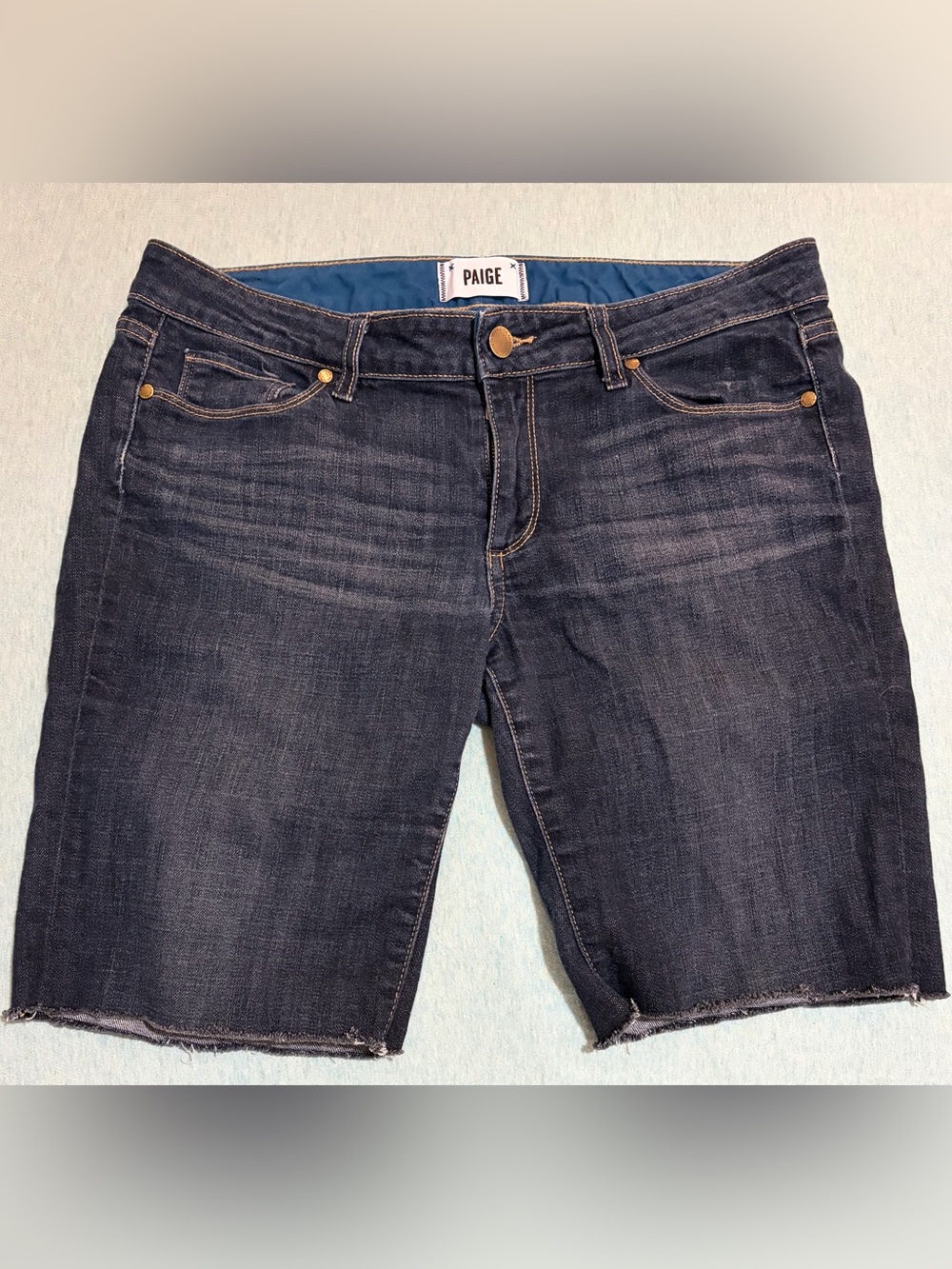 PAIGE Jax Mid-Rise Knee Shorts in Dean